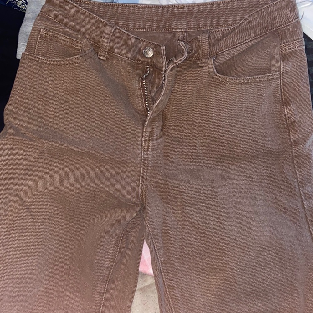 Brown ripped jeans